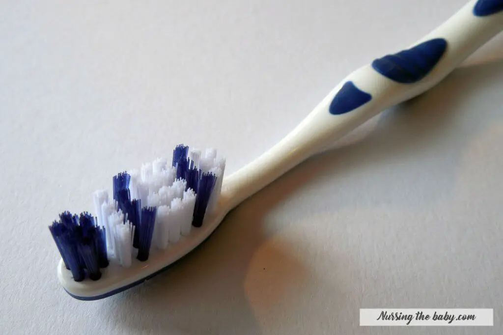 toothbrush to remove a milk stain